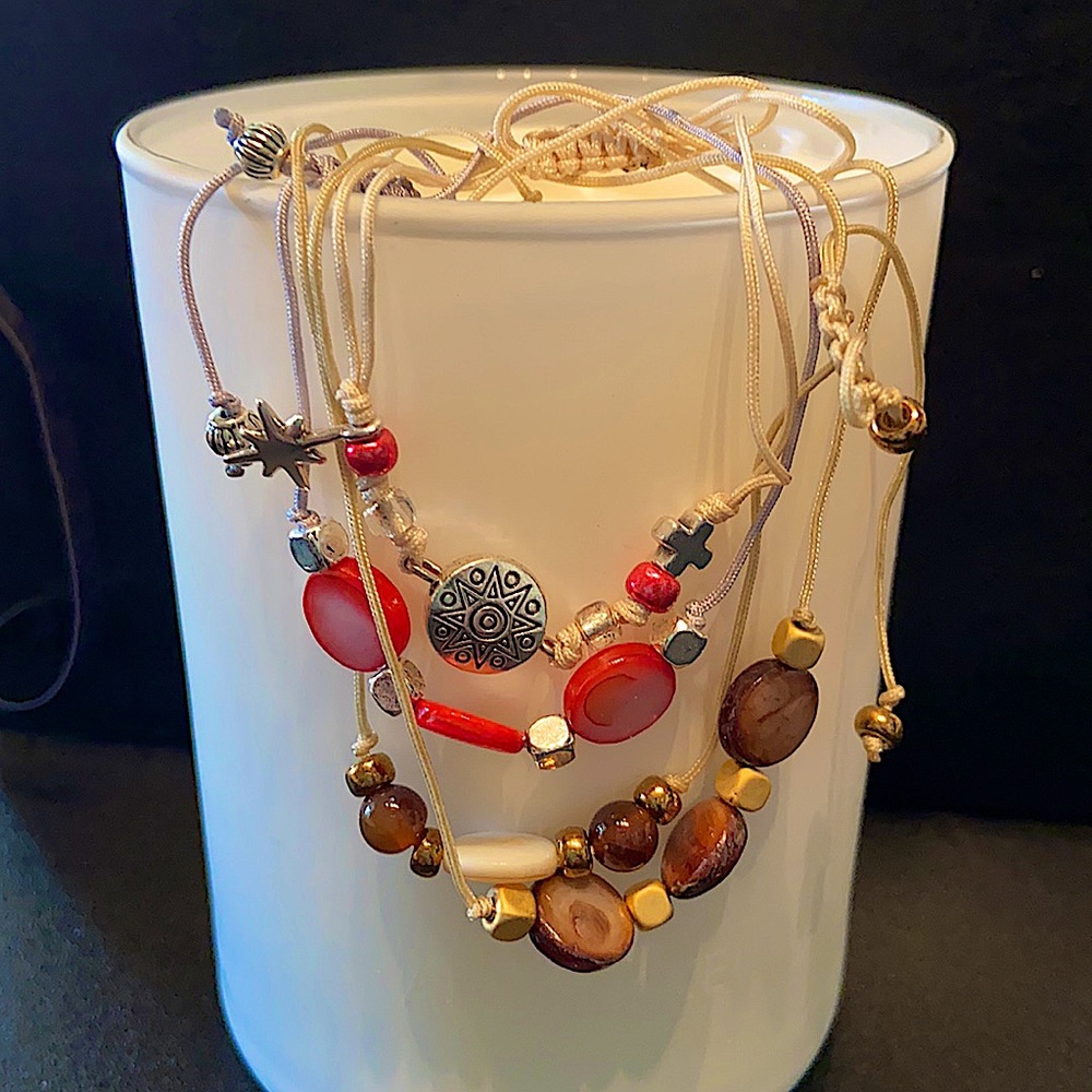 4 ADJUSTABLE STRING BRACELETS